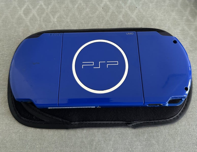 PSP 3000 – White & Blue Edition | 64GB | Fully Set Up Carousel 3