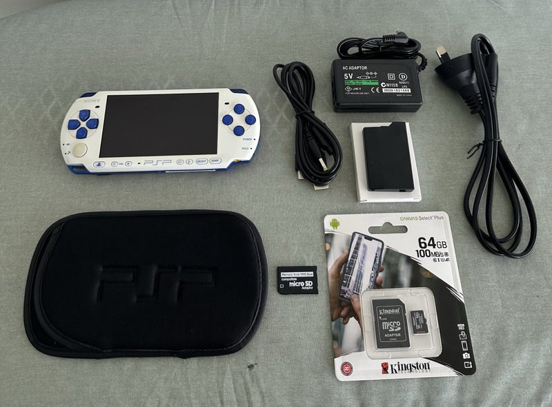 PSP 3000 – White & Blue Edition | 64GB | Fully Set Up Carousel 1