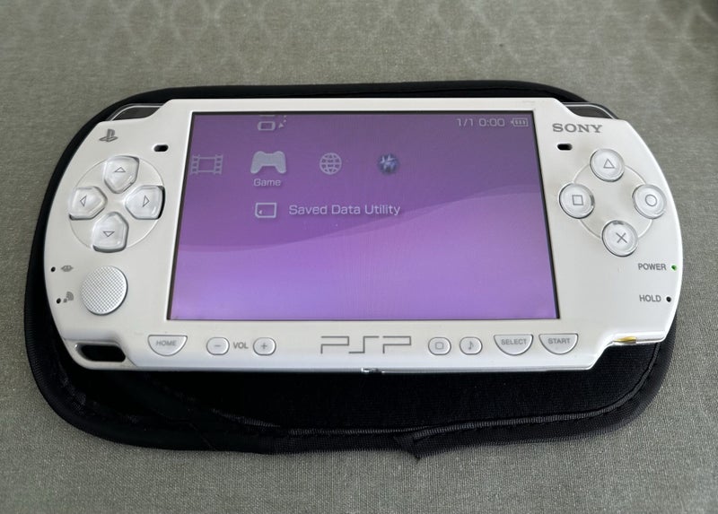 PSP 2000 – White | 64GB | Fully Set Up Carousel 2