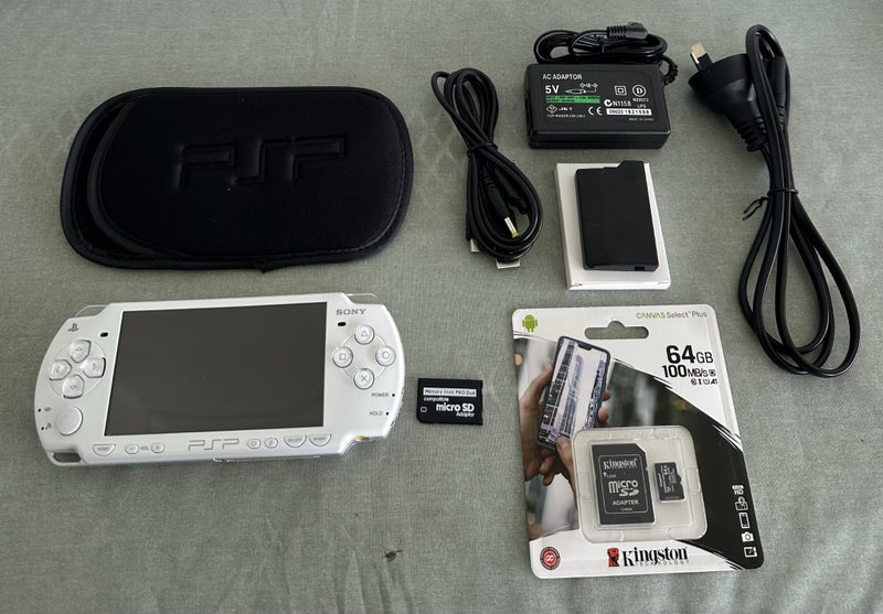 PSP 2000 – White | 64GB | Fully Set Up Carousel 1