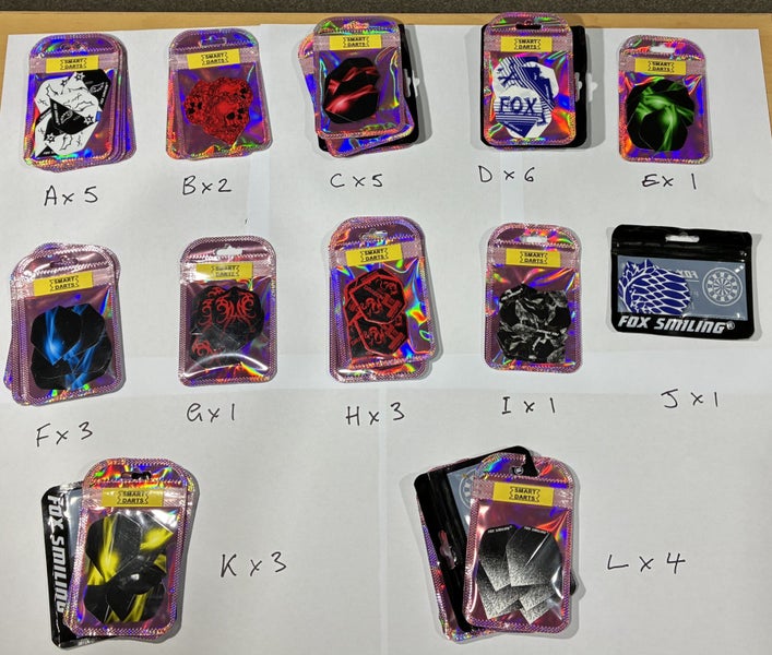 6 Dart flights in sealed unopened package. Carousel 1