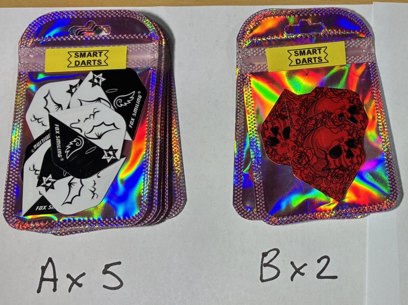 6 Dart flights in sealed unopened package. Carousel 2