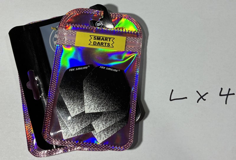 6 Dart flights in sealed unopened package. Carousel 9