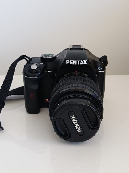 Pentax K-x (12.4MP)64827601023619111