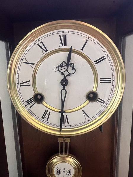 Schmidt Striking Wall Clock with Pendulum Carousel 2