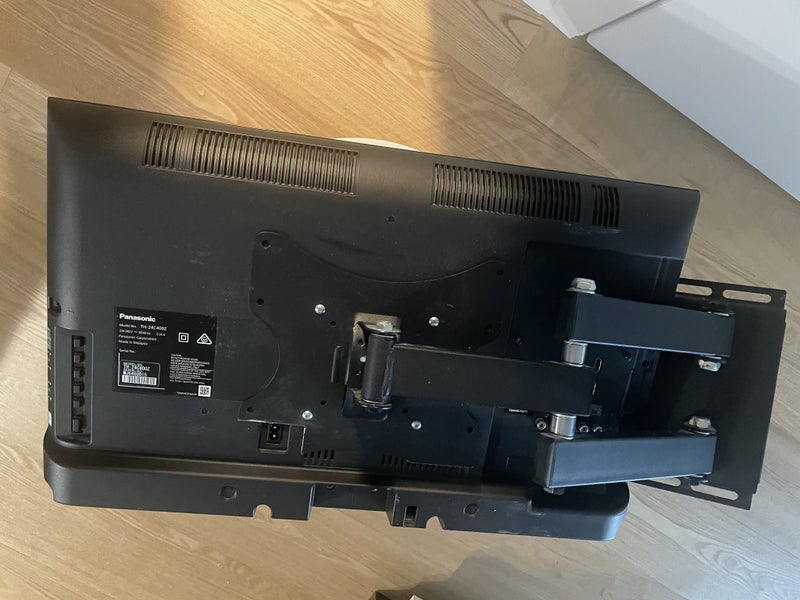 Panasonic 24 inch TV on TV arm wall mount Carousel 2