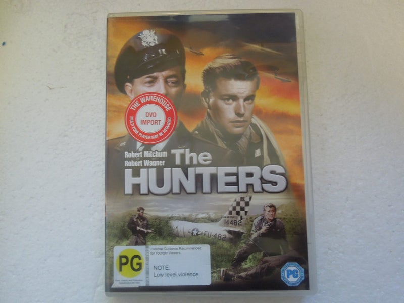 THE HUNTERS (Robert Mitchum & Robert Wagner) Carousel 1