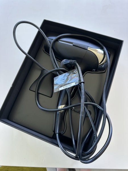 Ghd dryer works but only blows cold air comes with nozzle Carousel 1