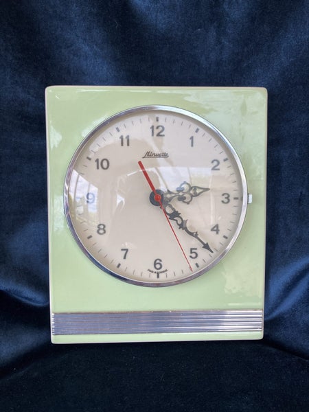 Mid century German ceramic wall clock Minuette Carousel 1