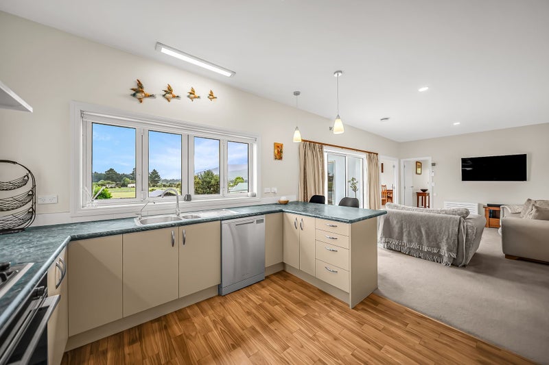 Manapouri Views with Garaging Galore64672799354753113