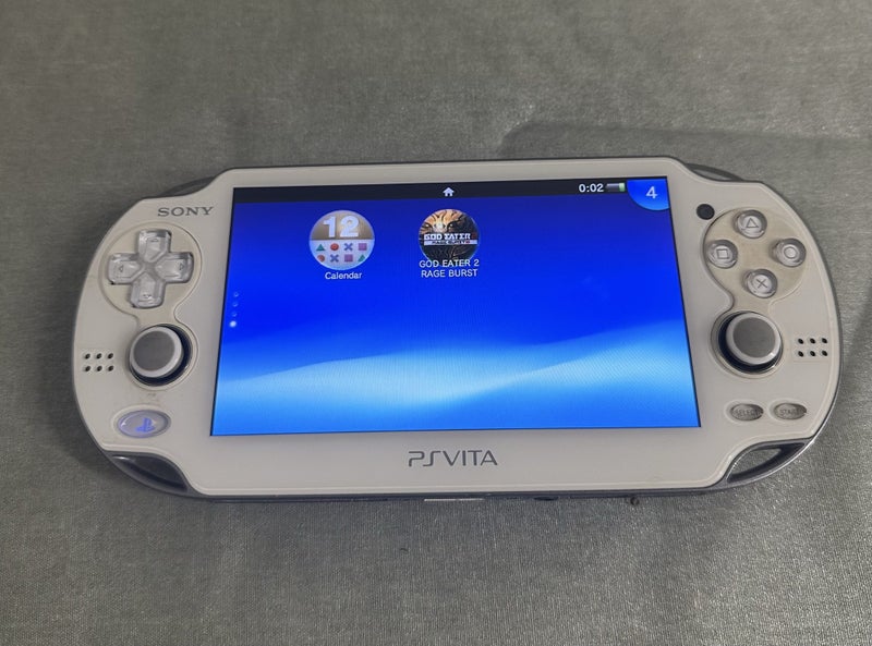 PS Vita (PCH-1000) – Crystal White | 64GB | Fully Set Up64697908572034111