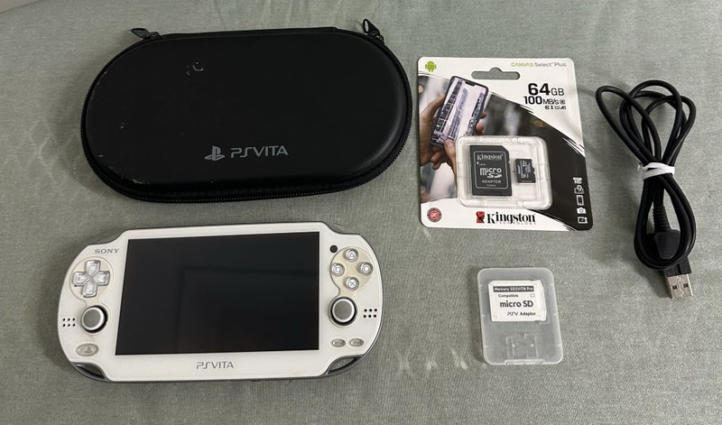 PS Vita (PCH-1000) – Crystal White | 64GB | Fully Set Up64697908572034110