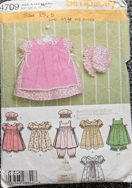 SIMPLICITY 4709, BABIES ' DRESS, PINAFORE, PANTALOONS, PANTIES, HAT SIZE XS, S Carousel 1