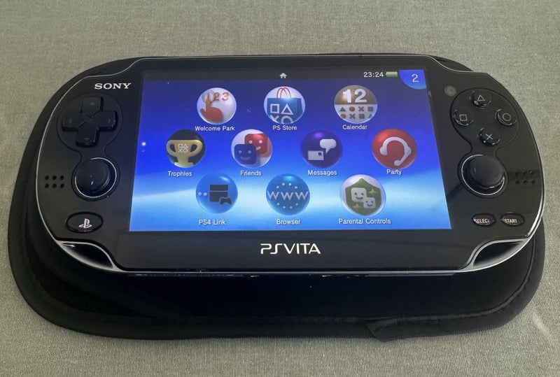 PS Vita – PCH-1100 (OLED Model) | 64GB | Fully Set Up64710700146178111