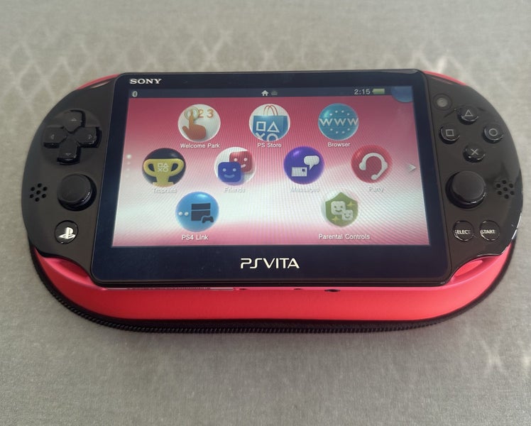 PS Vita 2000 – Pink / Black | 64GB | Fully Set Up64707837814787111