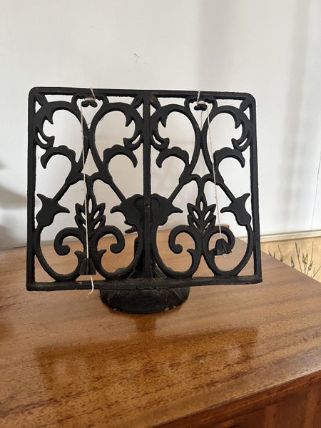 Caste iron stand. Book , cook book , art . Carousel 1