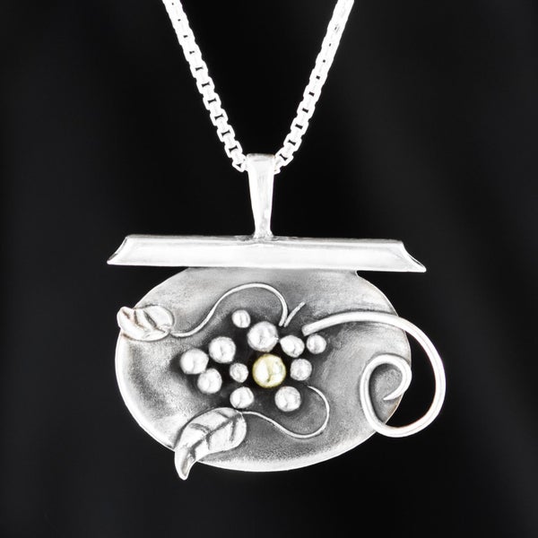 Sterling Silver and 9kt Gold New Life Pendant by New Zealand Artist Don Campbell Carousel 1