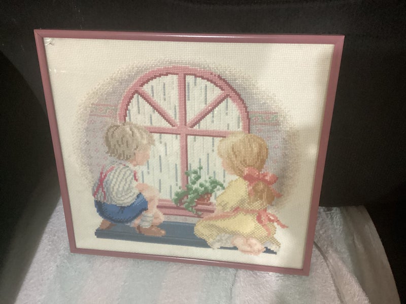 Cross stitch - boy and girl looking out the window at the rain Carousel 1