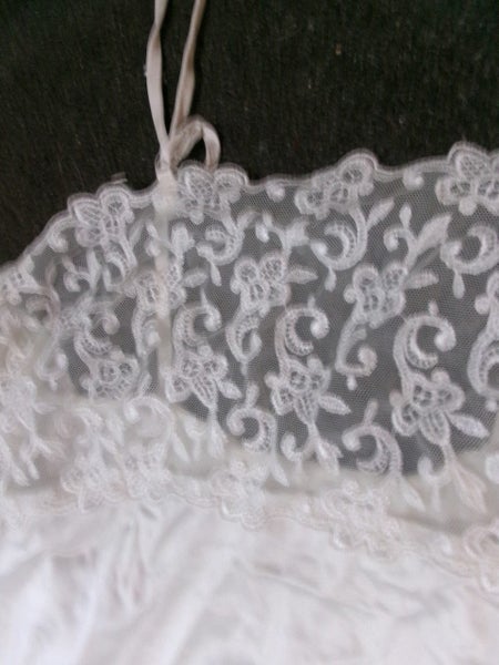 Lovely cream camisole with 15 cm deep pretty lace. by Berlei. Carousel 3