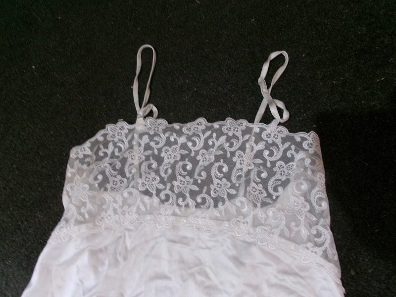 Lovely cream camisole with 15 cm deep pretty lace. by Berlei. Carousel 2