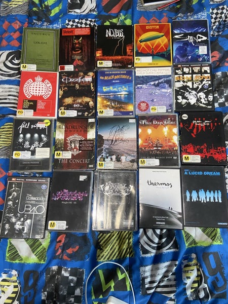 Large collection of music related DVDs. Carousel 1