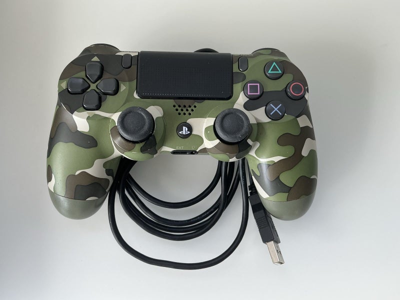 PlayStation PS4 with DualShock 4 Wireless Controller Carousel 2