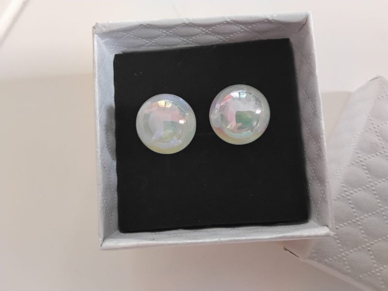 Pair of earrings, white, shiny and luminous. Brand new. Carousel 1