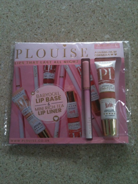 plouise magazine with two lip care Carousel 1