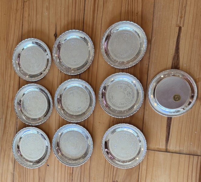 Set of 11 Swedish silver plated, engraved coasters.64806756125954110