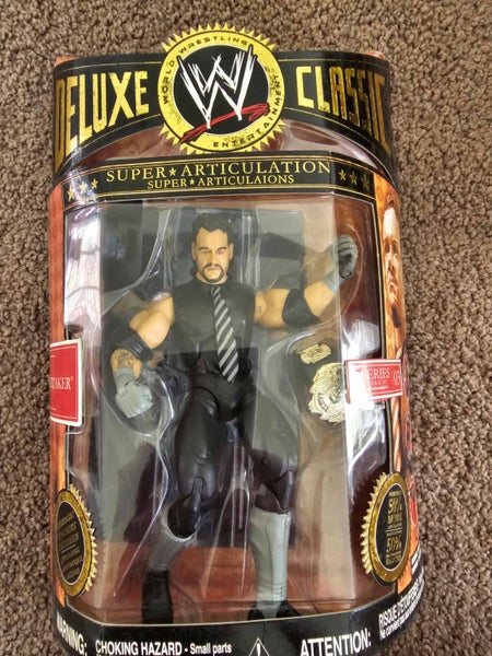 comic book plus undertaker taker action figure from 90 Carousel 1