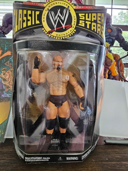 comic book plus Goldberg taker action figure from 90 Carousel 2