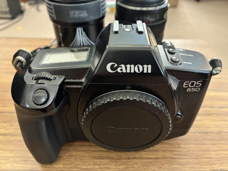 Canon EOS 650 (film camera) + 2 AF zoom lenses + Canon Speedlite 300EZ flash Carousel 1