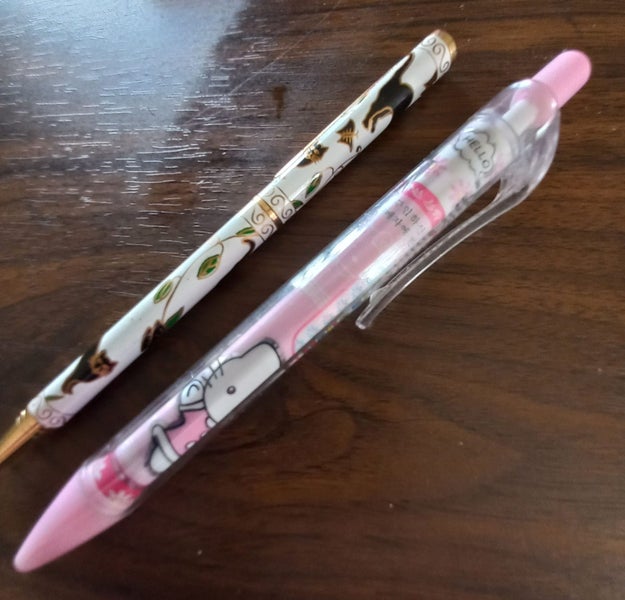 Hello Kitty and 2 other cat pens Carousel 1