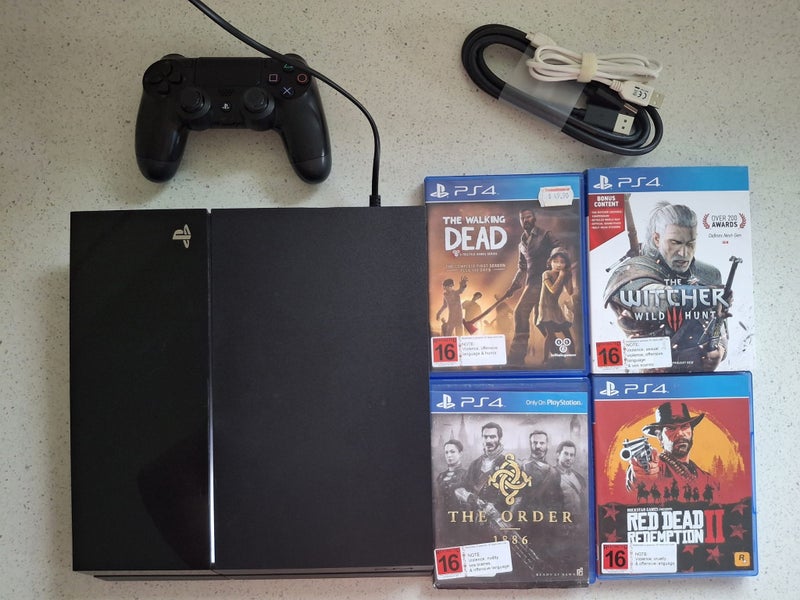 PlayStation 4 Console + 4 Games Included Carousel 2