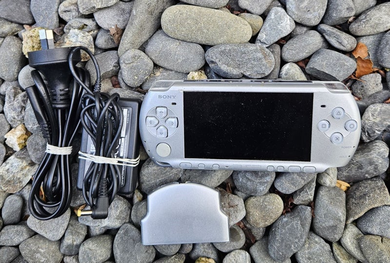 Silver Sony PSP 3002 Console Carousel 1