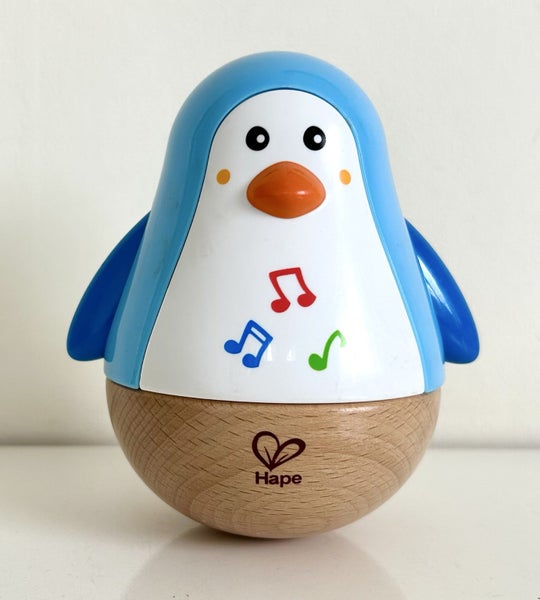 Hape Brand Wood & Plastic ‘Penguin Wobbler Musical Toy’ Carousel 1