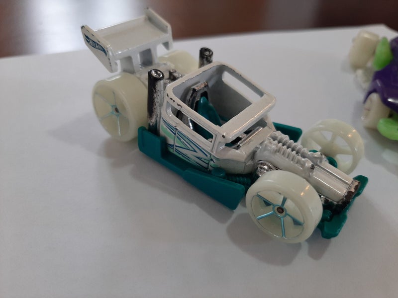 Hot Wheels Bone Speeder and Wattzup Carousel 2