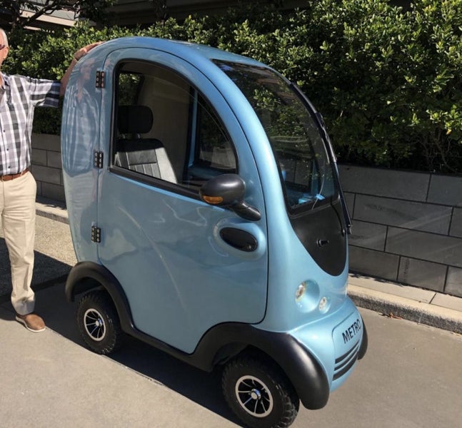 Covered Mobility Scooter Carousel 1