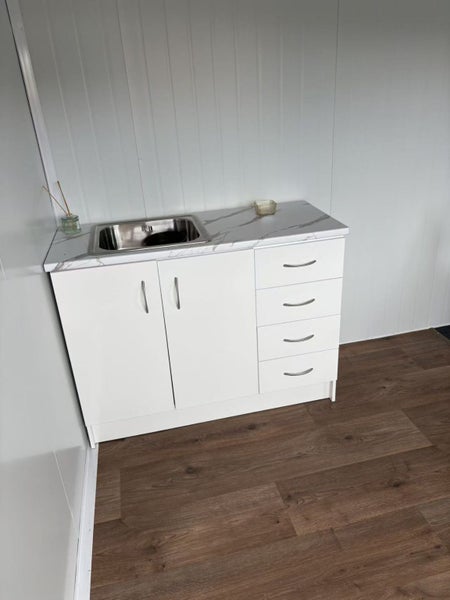 8.6x2.8m demo cabin ready to go -kitchen bathroom , power Carousel 1