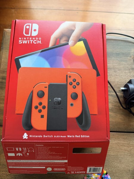 Nintendo Switch (OLED Model) Mario Red Edition Carousel 1