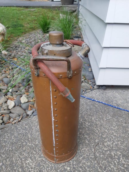 Antique copper fire extinguisher Carousel 2
