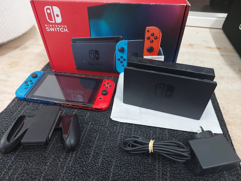 NINTENDO Switch Console (HAC-001(01) + Joycon Grip, Dock and Charger Carousel 1
