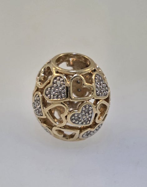 E & R 10k Gold & Diamond Heart Charm Carousel 1