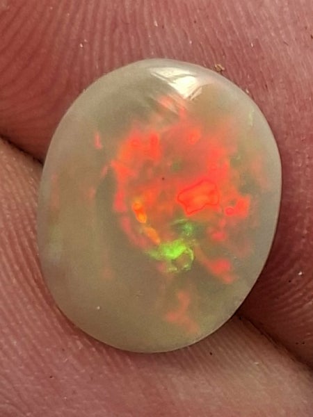 Australian Black Opal With RED Carousel 1