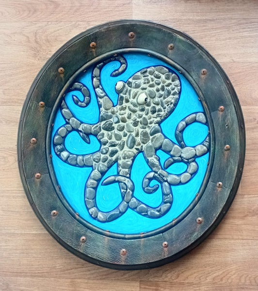 Striking rocky octopus in rustic metal frame Carousel 1