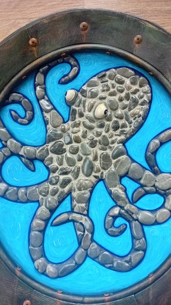 Striking rocky octopus in rustic metal frame Carousel 2