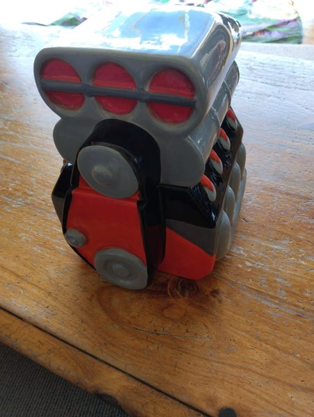 Supercharged V8 Biscuit Tin Carousel 1