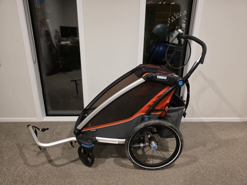 $1 RESERVE! Thule Chariot Cross Carousel 1