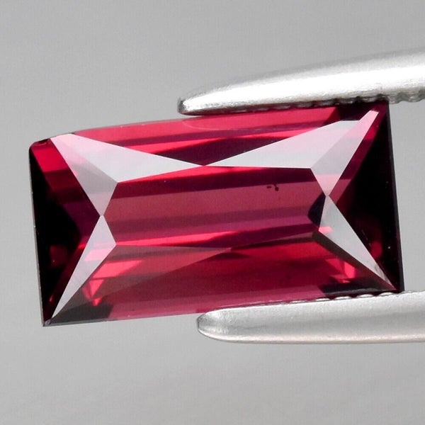 $1 RES * Buy Now $799.00 * 1.46ct Baguette Purplish Pink Garnet Loose Gemstone Carousel 1