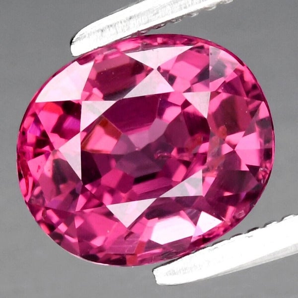 $1 RES * Buy Now $875.00 * 1.54ct Oval Purplish Pink Garnet Loose Gemstone Carousel 1